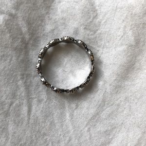Silver ring with flower details